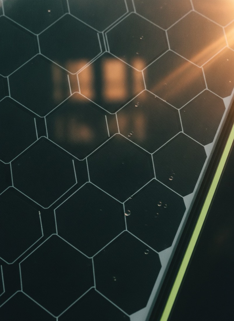 Close-up of monocrystalline solar cells at golden hour
